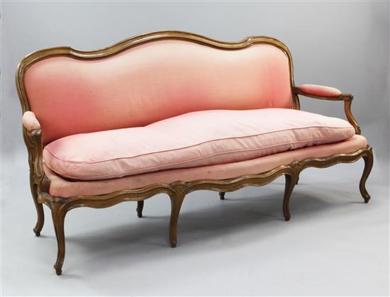 A Louis XVI carved beech canape corbeille, W.6ft 6in. H.3ft 4in.